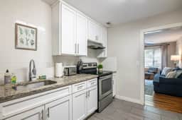 Vulcan View - 2 Units/Main Floor/Patios/Parking